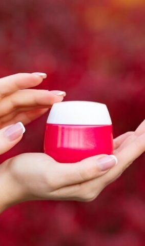 hands-holding-applying-cream-jar-skincare-product-proposal_474717-83137